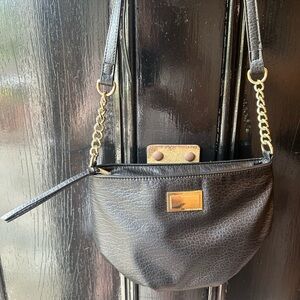 Juicy Couture Black faux leather cross body bag with gold accents